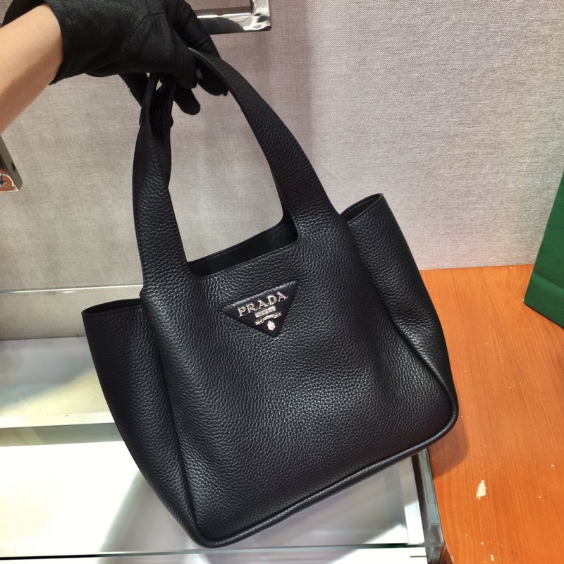 Pra*a bucket bags
